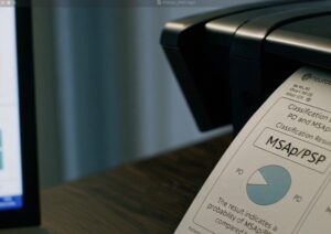 neuropacs AIDP classification report (PD vs MSAp/PSP) coming off a printer